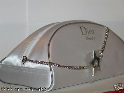 DIOR LARGE SILVER HARDCORE WHITE SATIN. BEAUTIFUL LUXURY MAKE UP BAG 