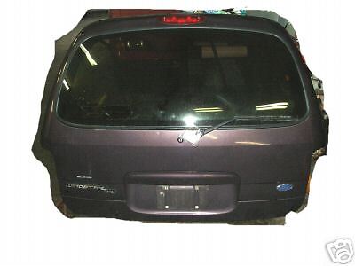 95 Ford Windstar tailgate, small dent left corner  